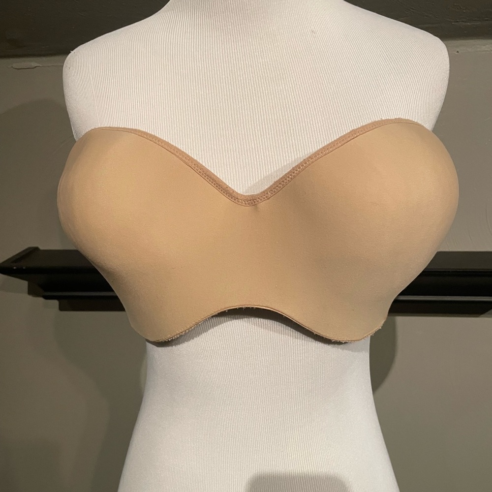 Nude colored strapless Bra
